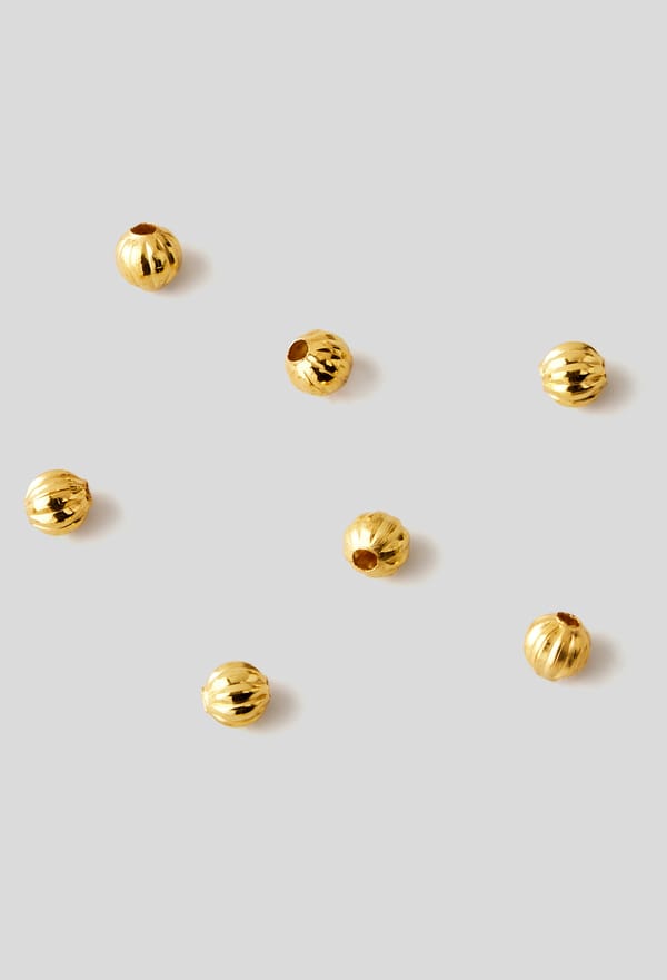 second-row-image de Perles Heishi intercalaires boule dorée